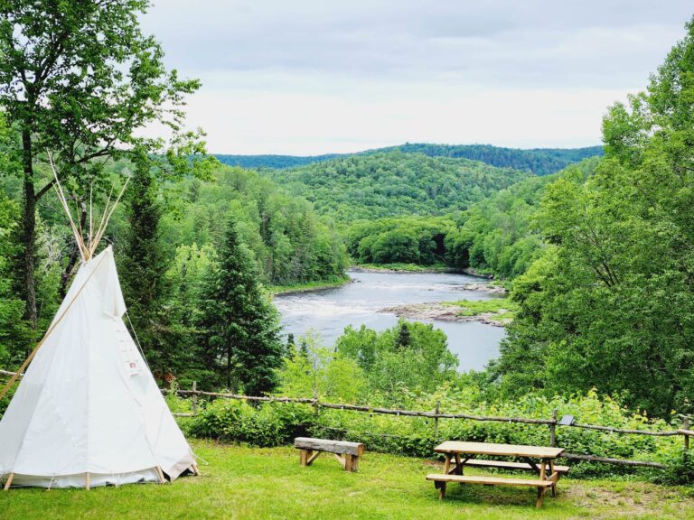 Tipi and view of the river and mountains