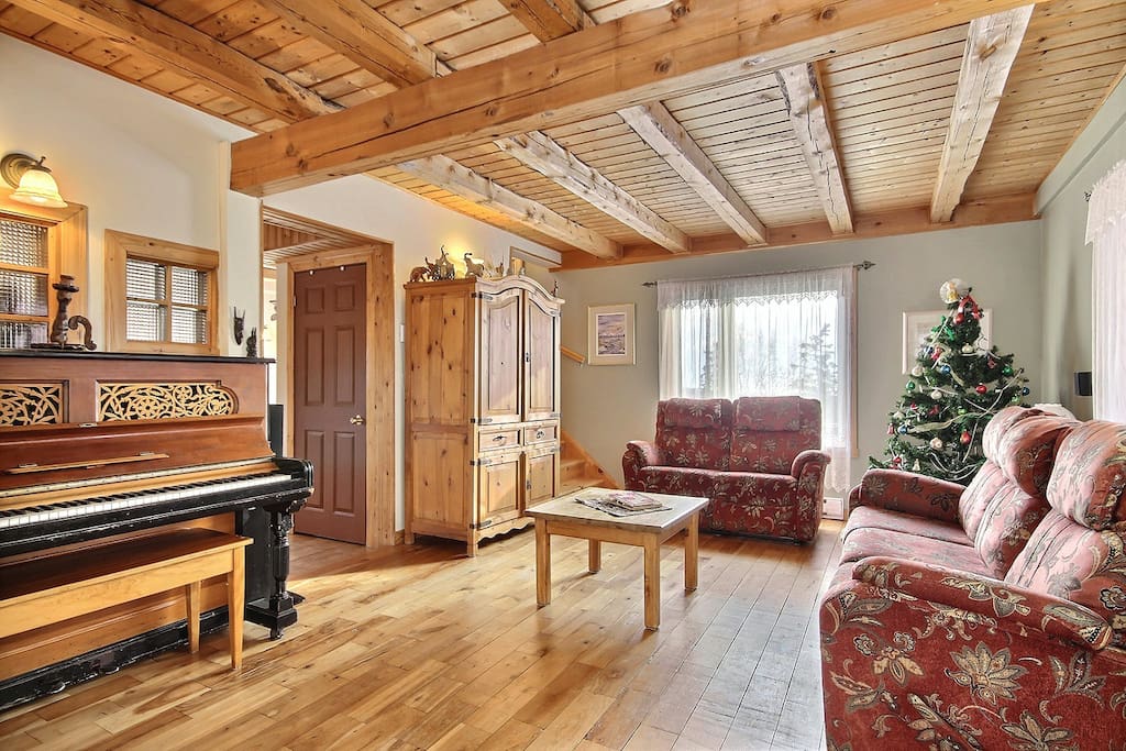 Living room with piano, different angle