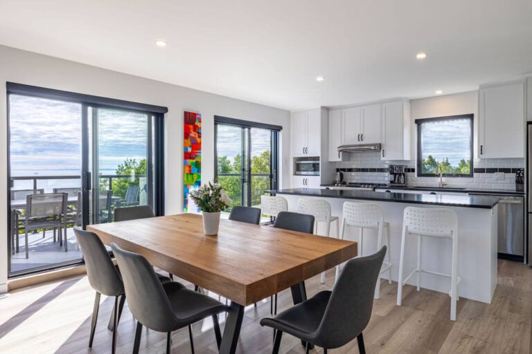 Dining room, kitchen and view